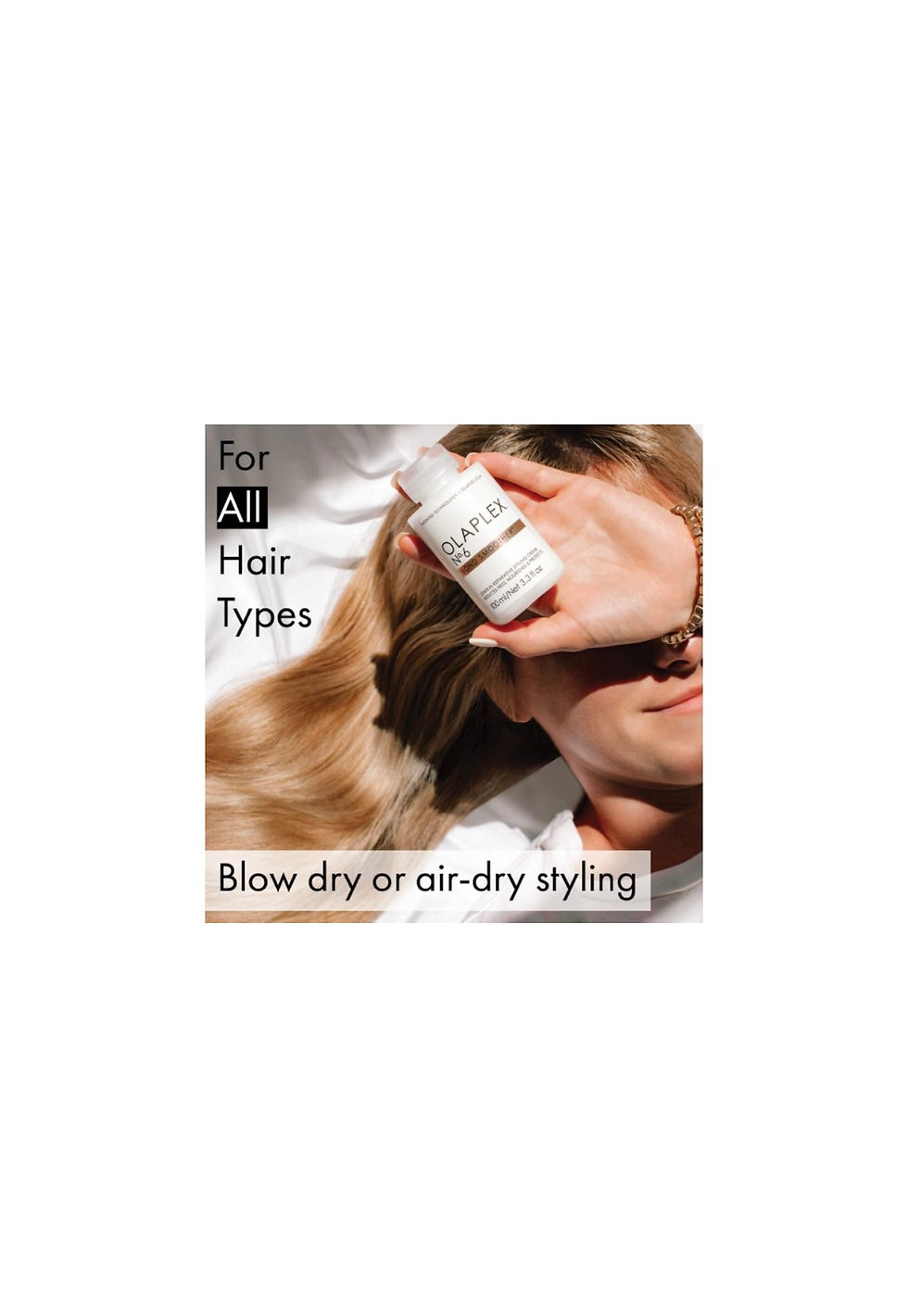 Miniatura: Woman holding hair product for all hair types, blow dry or air-dry styling.