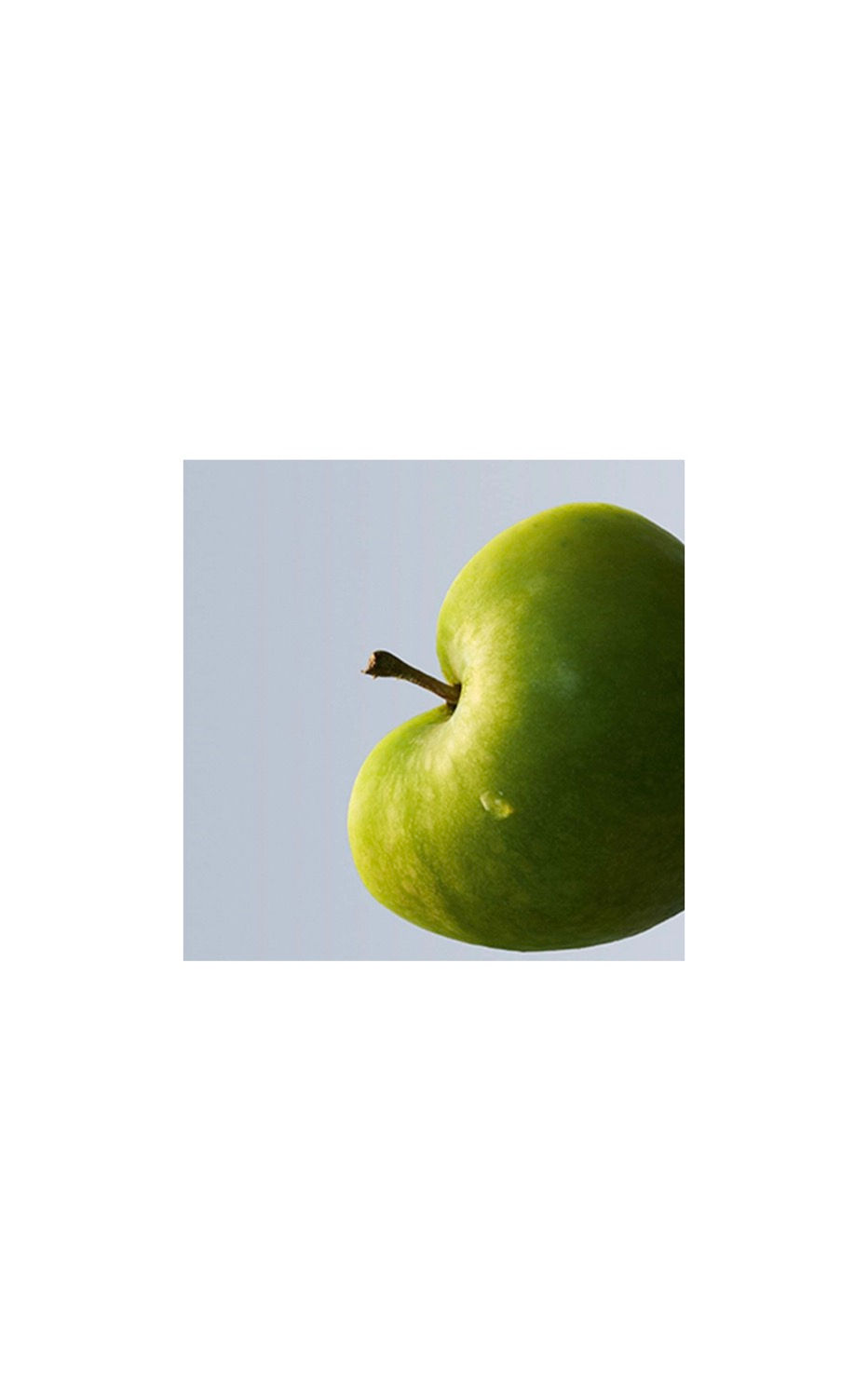 Миниатюра: Green apple with detailed texture against a soft, light-blue background
