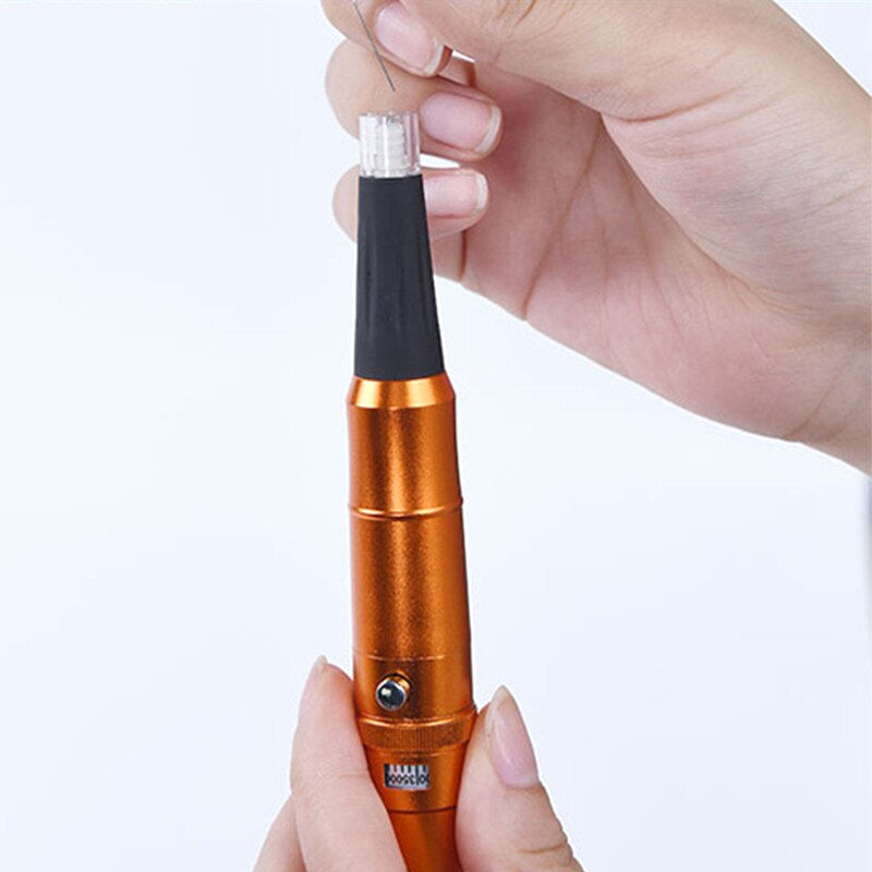 Миниатюра: Person's hands holding an orange permanent makeup pen for cosmetic procedures.