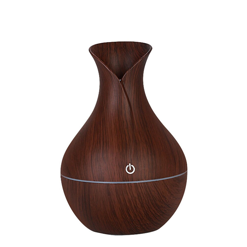 Thumbnail: Decorative wooden essential oil diffuser with power button for home relaxation.