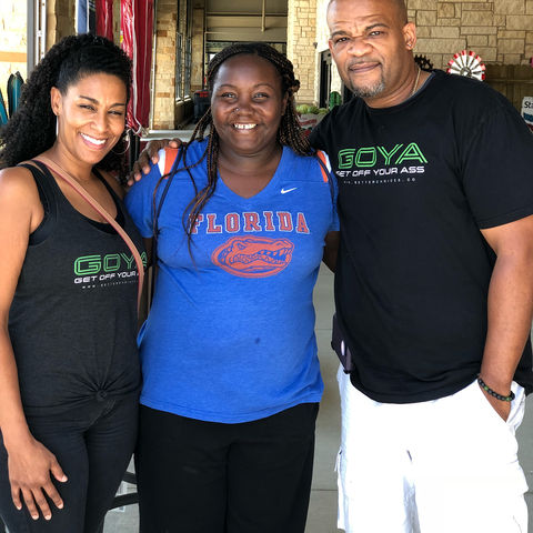 Eric and Maleka Beal wearing GOYA t-shirts