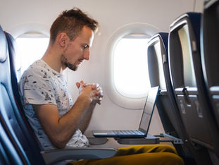 Travelling for Work Is Wrecking Your Back: Here's How to Protect It