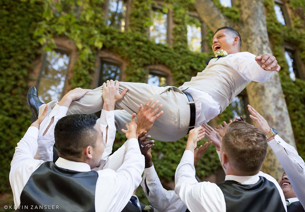This groom is so happy he's literally flying!