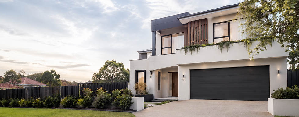 Modern custom home in Melbourne featuring contemporary architecture, double garage, landscaped front yard, and premium exterior finishes