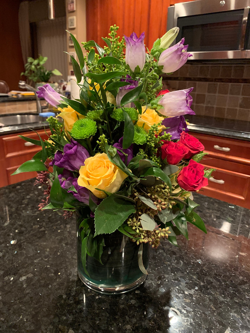 empty nesters finally, flower centerpiece, roses