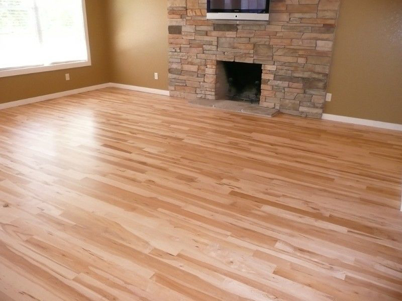 Wood flooring and fireplace surround