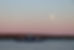 Ferry crossing to Brier Island with a small moon in a pink sky