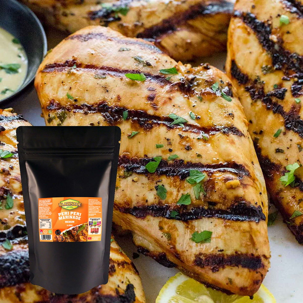 Thumbnail:  Grilled chicken breast seasoned with Peri Peri medium marinade, garnished with lemon slices and fresh herbs.