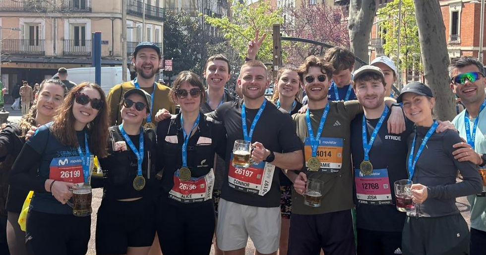 Runners and their medals from the movistar madrid Half 2026