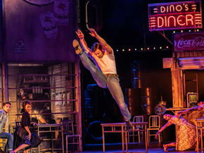 Harrison Dowzell as Luca with the Company of The Car Man. Photo by Johan Persson