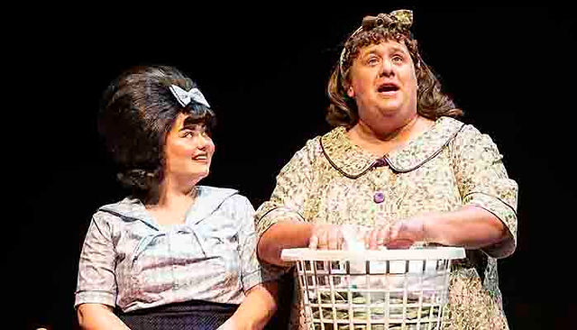 Alexandra Emmerson-Kirby as Tracy and Neil Hurst as Mrs Turnblad