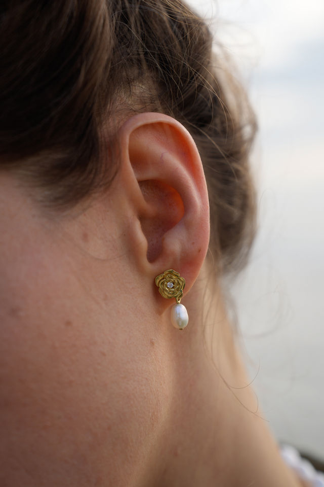 Model's ear with Rose Stud Earrings with Freshwater Pearls LIEVES