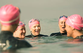 Swimmers talking in the sea_edited.jpg