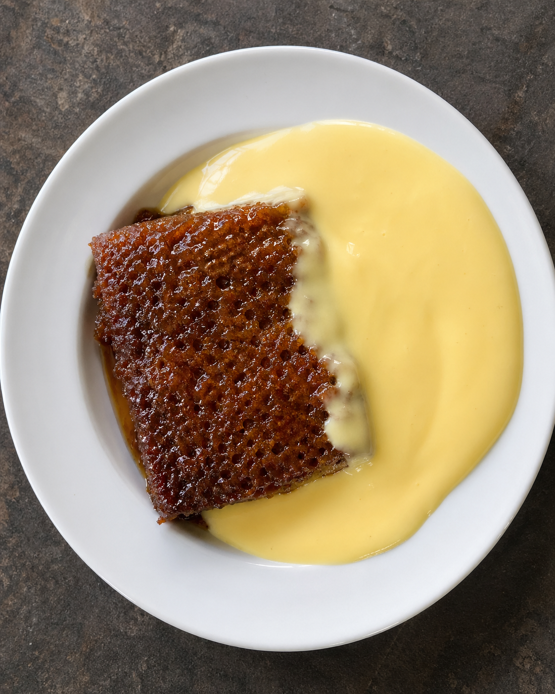Malva pudding served with custard.