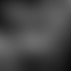 People in party attire cheer and dance under string lights with a DJ in the foreground, creating a lively and festive atmosphere.