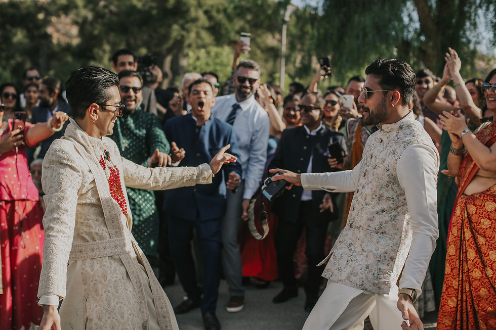 Groom and guests celebrate an outdoor baraat at Hummingbird Nest Ranch. Photo: Jenny Smith & Co.