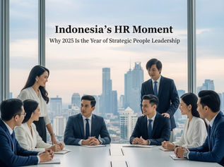 A group of Indonesian business leaders in a modern Jakarta boardroom discussing workforce strategy, symbolizing Indonesia’s HR leadership and transformation in 2025.