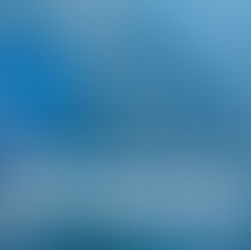 Bangko Sentral ng Pilipinas headquarters in Manila with the Philippine flag, representing upcoming monetary policy decisions and economic outlook.