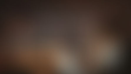 Two professionals in Singapore analyze marketing data on a laptop overlooking the Marina Bay skyline at night, symbolizing affiliate marketing’s rise as a growth engine.