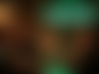 A group of friends laughing and chatting in a modern bar with Heineken bottles on the table, phones turned face-down, and a neon sign reading “From Screen to Scene.” The image symbolizes digital conversations turning into real-life connection.