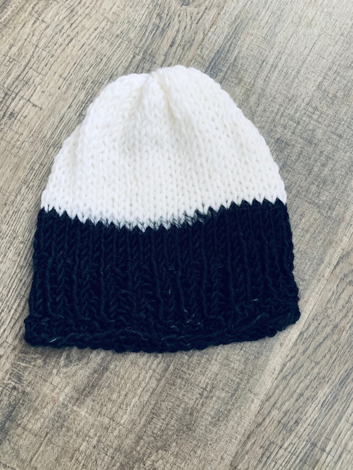 White and black knit hat