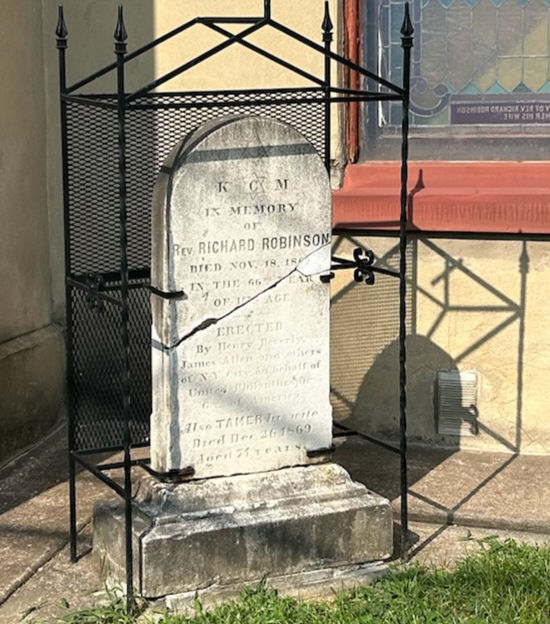 The tombstone of Rev. Richard Robinson outside of Campbell AME church in Frankfort. Killed due to public transportation discrimination.