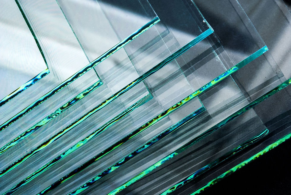 Stacked glass panels with green edges