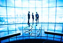 close-up-glasses-with-workers-background.jpg