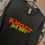 Thumbnail: Unisex T-shirt met de tekst 'Kmoet just niks' casual en eigenwijs statement voor relaxte dagen.
