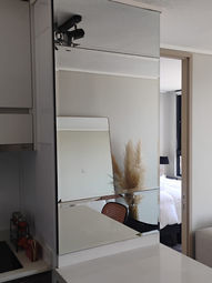 Muro espejado biselado