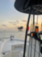 Fishing guides Venice Louisiana headed to fish at an oil rig.