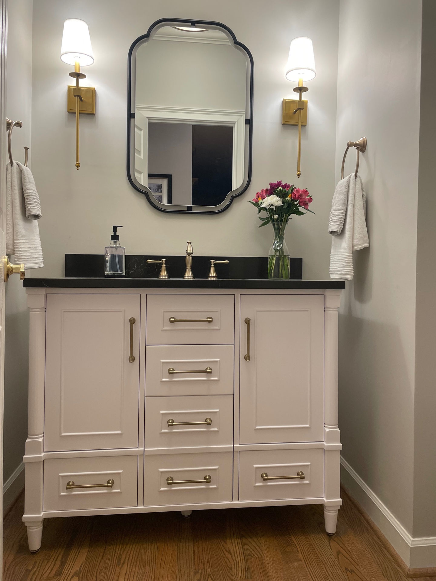 white vanity powder room.jpg