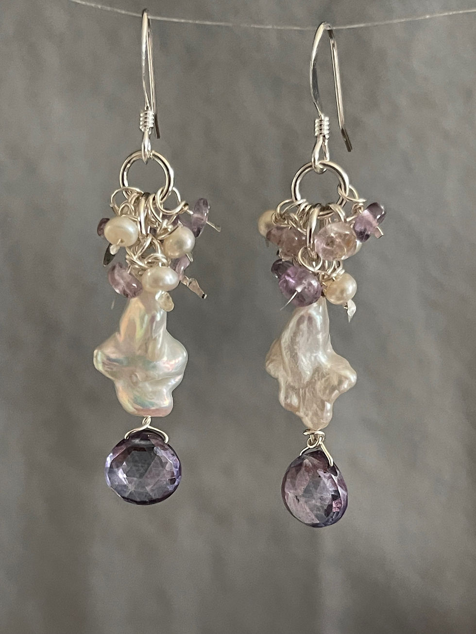 Pearls framed with pink amethyst rondelles and mystic briolettes