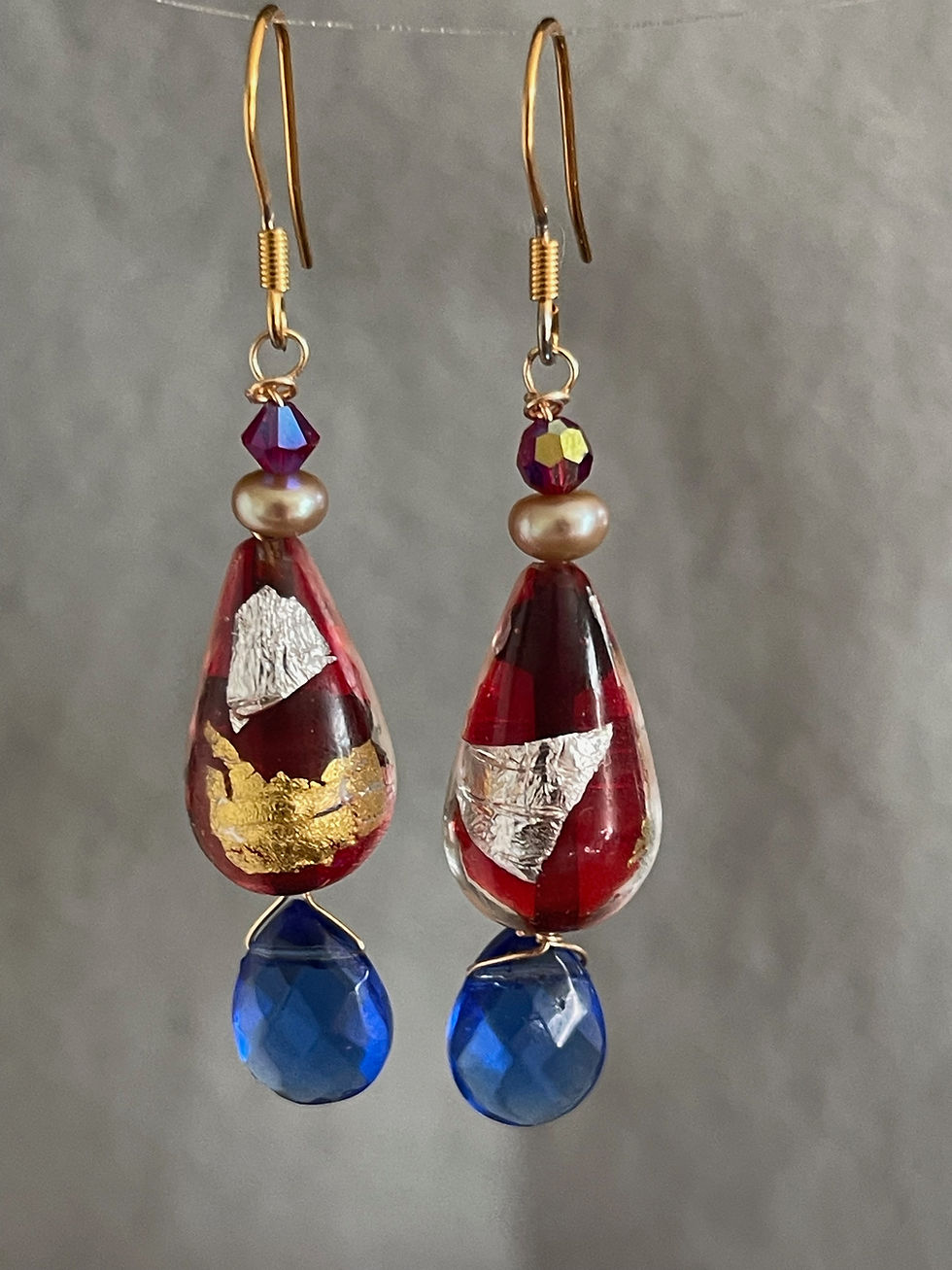 Red foil Italian glass earrings with blue crystal briolette