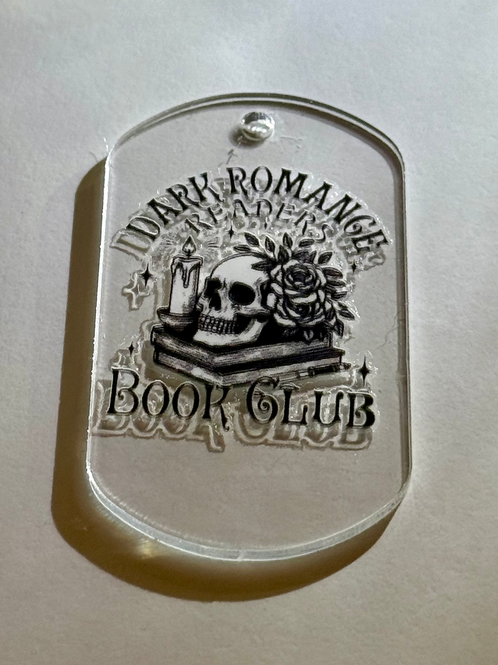 Thumbnail: Dog tag keyring (bookish themed)