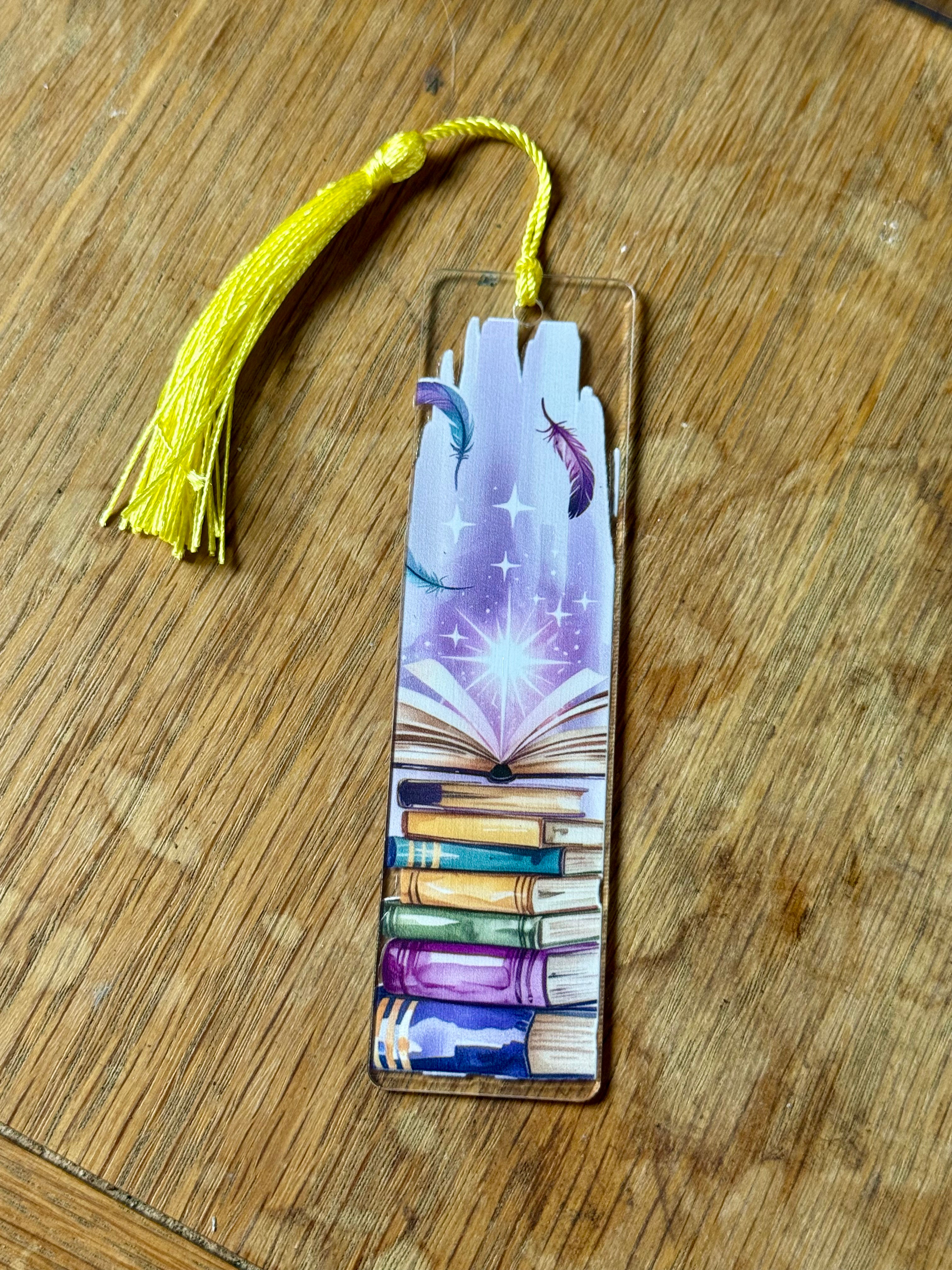 Book pile with feathers