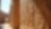 Eye-level view of an ancient Egyptian temple wall with hieroglyphs and carved gods