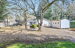 Front entrance of Oswego Cottage adult care home in Lake Oswego, OR, offering a warm and inviting environment for seniors.