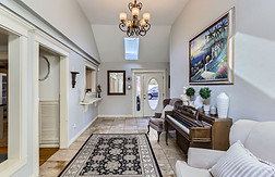 Compassionate caregiver assisting senior with mobility at Oswego Cottage, providing personalized elder care in Lake Oswego, Oregon.