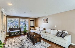 Seniors participating in group activity at Oswego Cottage, a licensed adult care home in Lake Oswego offering enrichment programs.