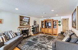 Caregiver assisting a happy senior at Oswego Cottage adult care home in Lake Oswego, providing compassionate 24/7 senior care.