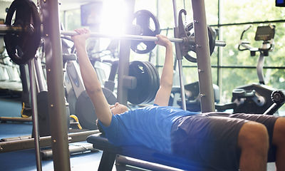 Weights at Gym, bench press, squat, power lifting, delayed onset muscle soreness, DOMS