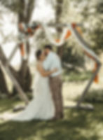 Bride and groom's first kiss on their wedding day