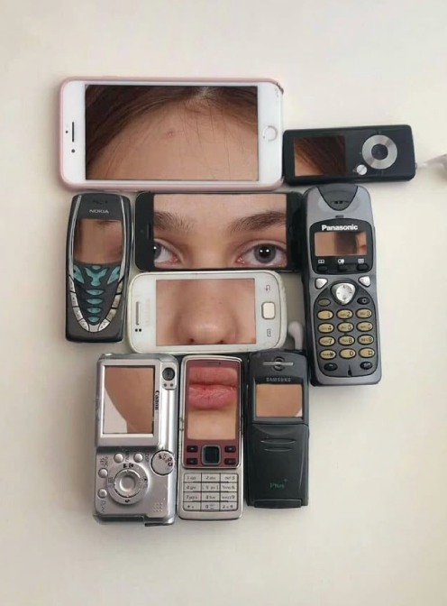 Human face composed of vintage and modern mobile phones arranged on beige background.