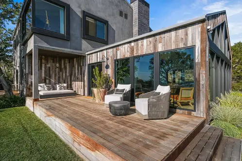 Exterior Patio of Malibu Home includes rustic siding