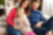 cute-little-girl-with-parents-playing-by-mobile-phone-home.jpg