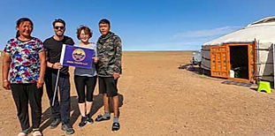 Nomadic family members: Members of a traditional Mongolian nomadic family.