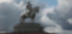 A majestic statue of Chinggis Khaan, the legendary Mongolian leader, standing tall at Tsonjin Boldog