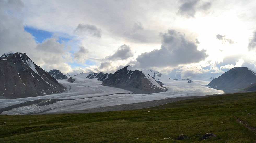 Glacier and the Tavan Bogd peaks under clouds in Altai Tavan Bogd National Park, western Mongolia