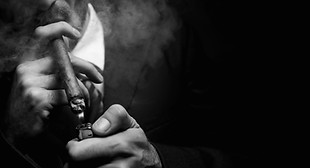 man smoking cigar